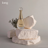 Flacon de parfum élégant en verre en forme de goutte d'eau avec bouchon en verre sphérique, col côtelé doré, livré avec du parfum liquide