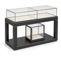 Ensemble de vitrines de présentation de bijoux de style chinois, îlot central en verre avec cadre noir pour l'exposition de parfums et cosmétiques en showroom