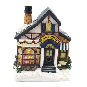 Resin craft 2023 gift idea custom wholesale LED light holiday village lighted christmas decoration house