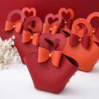 Boîte à bonbons créative en cuir portable pour mariage, sacs de distribution de cadeaux de mariage, boîte d'emballage de bonbons de Noël, mini sac à main