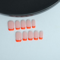Uñas artificiales cortas de estilo francés naranja reutilizables de alta calidad, diseño fresco hecho a mano para aplicaciones en los dedos, venta al por mayor de fábrica