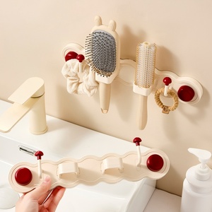 Support OEM Modern Plastic Bathroom Comb Rack Storage Hair Band Hair Tie Hook <b>Wall</b>-<b>mounted</b> Non-drilling Comb Storage Rack - Product Image 1