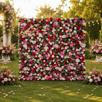 Nouvelle conception de toile de fond enroulable avec mur de fleurs artificielles roses pour la décoration de scène de mariage