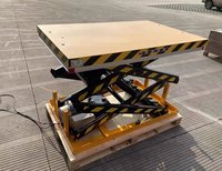 Table élévatrice à ciseaux stationnaire robuste et à haute capacité de charge, facile à entretenir, pour réduire les temps d'arrêt en usine