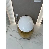 Nouvelle conception de toilette intelligente sans réservoir, de forme ronde, en or, avec système de chasse d'eau automatique par capteur intelligent