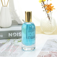 Bouchon de rouleau de bouteille de parfum en verre nouveauté de luxe personnalisé 50ml 100ml emballage épais transparent couvercle de cylindre forme carrée boîte en liège
