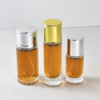 Bouteilles de parfum en verre à sertir sous pression rondes épaisses de 20ml 30ml 50ml vaporisateur atomiseur bouteille de parfum en verre avec couvercle en or