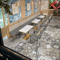 Table de salle à manger de luxe légère en marbre et roche Ensemble de table de restaurant occidental carré long avec bord en acier inoxydable sans couture pour salon de thé