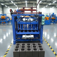 Machine automatique de fabrication de blocs de ciment et de briques creuses pour pavés