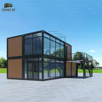 Diseño Personalizado de Casa Contenedor de 2 Pisos para Construcción Modular Rápida, con Muro Cortina de Vidrio y Estructura Duradera