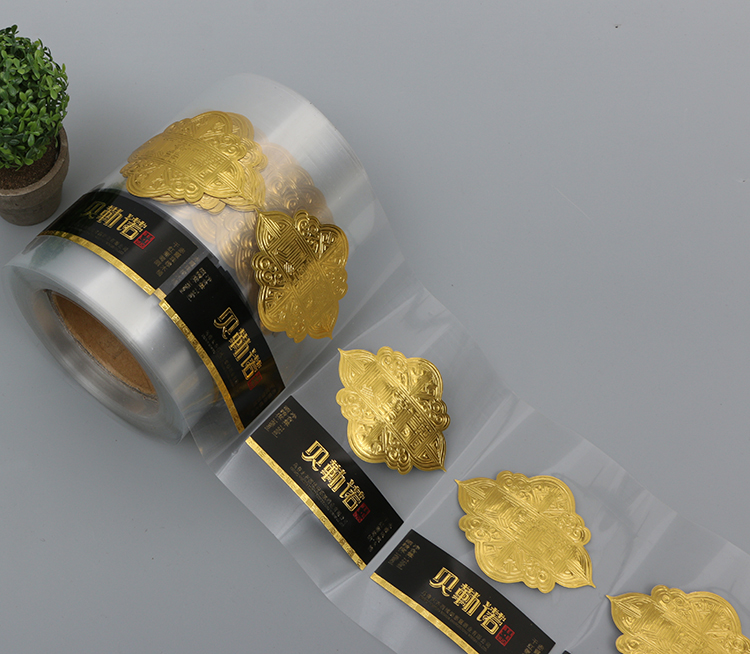 Custom Printing Roll Adhesive Eco-friendly Water-proof Gold Foil Hot Stamping Clear PET Stickers for Wine Beverage Packaging