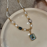 Collier Pendentif Perle d'Eau Douce et Nacre, Perles de Coquille d'Ormeau Naturel, Ras du Cou Populaire, Luxe Léger, Niche Haut de Gamme