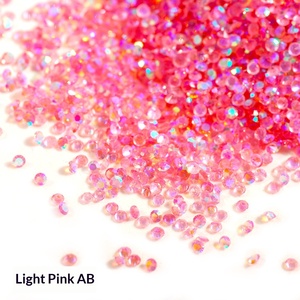 <span class=keywords><strong>Micro</strong></span>-strass en verre à double pointe couleur <span class=keywords><strong>AB</strong></span> de 1,2 mm pour accessoires de perçage à ongles DIY - Product Image 1