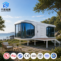 Maisons conteneurs de luxe de 40 pieds, de style capsule, personnalisées en usine, adaptées aux complexes hôteliers et aux hôtels, avec fenêtres panoramiques en verre.