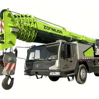 Grue mobile sur camion d'occasion de haute qualité QY70KC 2022, 70 tonnes, 90 % neuve, hauteur de levage 64,5 m, état de fonctionnement A5 pour la construction