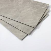 Carrelage flottant en vinyle imperméable et facile à installer Revêtement de sol SPC en pierre à carreaux de marbre