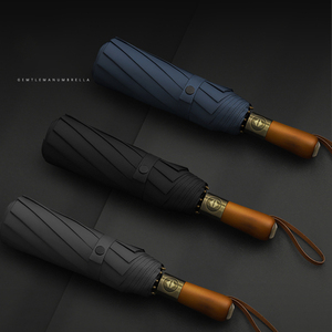 Nuevo <span class=keywords><strong>Comprar</strong></span> Bulk Mango de madera Diseñador 300T Pongee <span class=keywords><strong>Paraguas</strong></span> Personalizado Compacto Lluvia Automático A prueba de viento 3 <span class=keywords><strong>Paraguas</strong></span> <span class=keywords><strong>plegable</strong></span> - Product Image 2