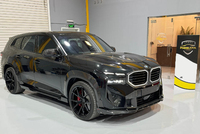 RNG Style prix d'usine Kit de carrosserie jupe latérale jupes latérales en Fiber de carbone sèche pour BMW BMW XM G09 assemblage de voiture