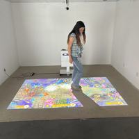 Système de projection interactive pour salle de jeux, avec projection murale et au sol, pour diverses activités sportives, attrayant et immersif