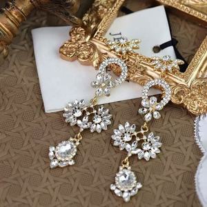 Boucles d'oreilles pendantes en argent de style européen et américain, longues, avec zircon immortel, design géométrique en forme de goutte d'eau, de fleur et de feuille, tendance - Product Image 5