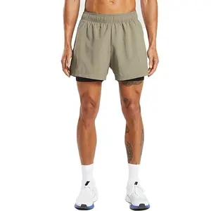 Wholesale Double Lined Split Hem Design Training Slim Fit 5 "Inseam Shorts Zip Side Pocket Sports Polyester Spandex Shorts Men