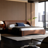 Cadre de lit en cuir minimaliste italien, lit rembourré moderne de luxe avec tête de lit incurvée, meubles de taille king pour la maison et l'hôtel