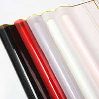 Papier d'emballage translucide imperméable DLBZ, feuille de papier d'emballage floral enduit de PVC avec bord doré pour emballer des cadeaux floraux