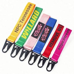 Porte-clés personnalisé en tissu brodé, lanière en métal, bracelet porte-clés, porte-étiquette, porte-clés par sublimation à bas prix pour la vente en gros - Product Image 1