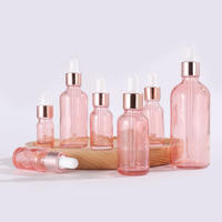 Flacon compte-gouttes de sérum d'huile essentielle en verre rose 30 15 50ml tailles de pipette soins de la peau récipient cosmétique poli