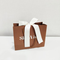 Sac en papier d'emballage spécial, sac cadeau de luxe personnalisé avec poignée, sac en papier d'emballage pour les achats professionnels