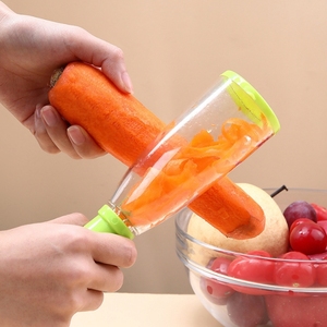 Éplucheur manuel en plastique pour fruits et légumes (carottes, pommes, pommes de terre) avec récipient de rangement - Product Image 1