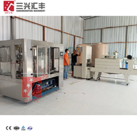 Nouvelle ligne de production automatique électrique à haute productivité pour le remplissage de bouteilles d'eau, de boissons et de produits chimiques pour le Pérou