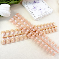 Faux ongles courts à presser, forme French demi-lune œil de chat, couleur unie nude poudré, effet illuminateur, chic, vente en gros, ongles finis