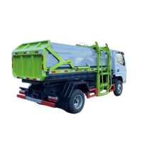 Camion à ordures compacteur Dongfeng 4x2 diesel à boîte de vitesses manuelle et chargement latéral, véhicule professionnel de transfert de déchets pour hôtels