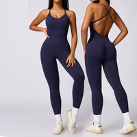Creux beau dos sans couture une pièce Yoga vêtements avec coussinets de poitrine fesse levage sport combinaison femmes vêtements de sport