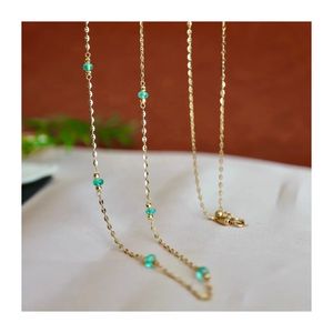 เครื่องประดับมินิมอล Xinfly ของขวัญสุดพิเศษ สร้อยคอทอง 18K ประดับด้วยลูกปัดพลอยธรรมชาติ มรกต และโซ่ทอง 18K - Product Image 1