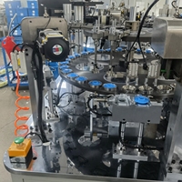 Machine d'assemblage entièrement automatique NBTY pour flacons pompe airless en plastique, flacons de crème pour le visage et pots en acrylique