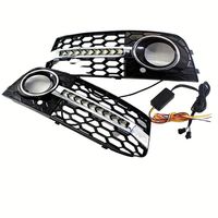 YW969 pour Audi A4B8 2009-2011 avec feux de jour dynamiques, clignotants jaunes, calandre en maille et enjoliveurs de phares antibrouillard.