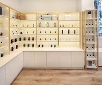 Dubai Luxury Perfume Shop Interior Design Décoration Présentoirs Magasin de maquillage Présentoir en bois pour huiles essentielles Étagère murale