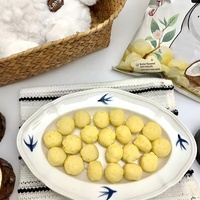 65g Snacks de céréales semi-mous gonflés, sans graisses trans, saveur noix de coco et thé blanc, en forme de chien mignon, personnalisables, vente en gros pour KTV et fêtes