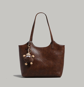 Bolso Tote de Hombro Portátil de Gran Capacidad, Estilo Retro 2026, Textura de Cuero Suave, Asa Única, Estilo Moderno - Product Image 1