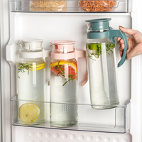 Vente flash d'été : Carafe à eau en verre écologique résistante à la chaleur de 800 ml avec couvercle en plastique et poignée, design minimaliste pour jus froid, lait, thé