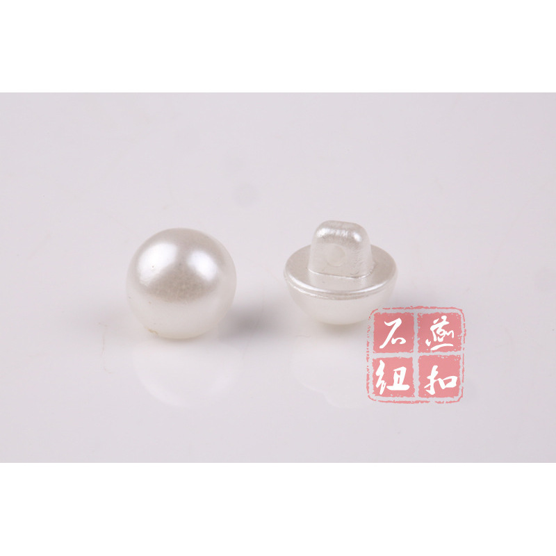 Hand-sewn mushroom pearl buttons