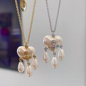 Collar y Pendientes de Perlas de Tres Gotas Saturno Versión Alta Western Queen Mother Vivienne, Joyería de Corazón con Borla Atrapasueños - Product Image 2