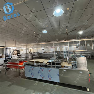 Machine à pain automatique pour la fabrication de tortillas, de crêpes, de chapatis et de roti, avec four de cuisson et système de refroidissement, équipée d'un moteur - Product Image 4