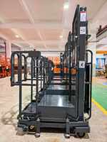 Plateforme élévatrice mobile semi-hydraulique pour la manutention, capacité 200 kg, hauteur de levage 4,5 m, pour usage en entrepôt logistique