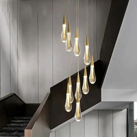 Lustre haut plafond en forme d'ampoule d'escalier moderne simple Villa Salon Long Drop Lustre en cristal Suspension
