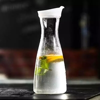 Pichet à jus mimosa très vendu en gros Carafe à boissons en plastique avec couvercle