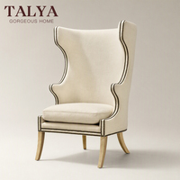 Fauteuil d'appoint moderne de luxe rembourré avec dossier haut et garniture cloutée, idéal pour hôtels de luxe et mobilier de maison
