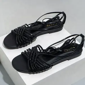 Nuovi sandali di moda di Design Sexy sandali piatti da spiaggia in Pu pantofole Vintage con fasciatura da donna sandalo Vintage durevole